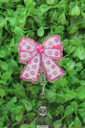 Pink Paw Print Bow Badge Reel
